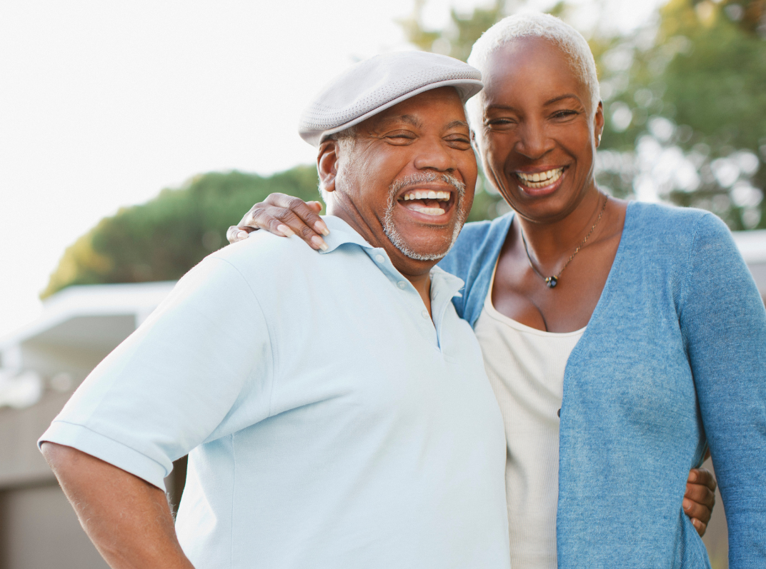 Two smiling older adults