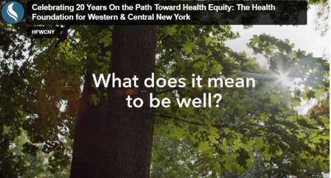 Screenshot from the Health Foundation's video reading "what does it mean to be well"